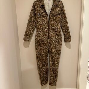 Free People brown and gold floral jumpsuit.